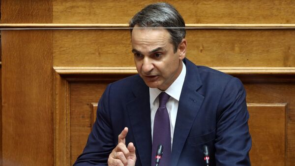 Mısır ve İtalya ile ayrı ayrı imzalanan deniz yetki alanlarını sınırlandırma anlaşmalarının görüşüldüğü parlamentoya seslenen Yunanistan Başbakanı Kiriakos Miçotakis - Sputnik Türkiye