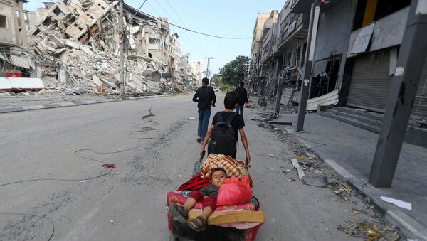 BM: Gazze'ye saldırılarda 10 bine yakın Filistinlinin evlerini terk etmek zorunda kaldığı tahmin ediliyor - Sputnik Türkiye
