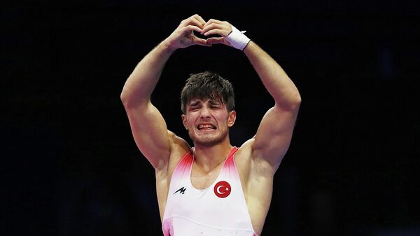 Sırbistan'da düzenlenen Dünya Güreş Şampiyonası'nda grekoromen stil 77 kiloda Yunus Emre Başar, bronz madalya kazandı. - Sputnik Türkiye