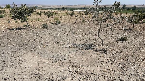 Suriye'nin kuzeyinden Gaziantep'in Karkamış ilçesine 4 roket atıldı. Roketlerin atıldığı alan incelemeye alındı.  - Sputnik Türkiye