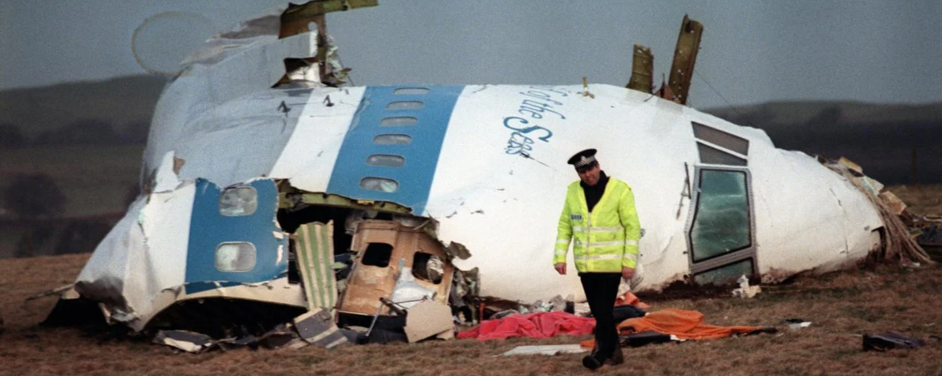 İskoç yetkililer, 34 yıl önce Lockerbie kasabası üzerinde Pan Am 103 sefer sayılı uçağın infilakına neden olan bombayı yapmakla suçlanan Libyalı Ebu Agila Muhammed Mesut'un ABD'de gözaltına alındığını duyurdu. - Sputnik Türkiye, 1920, 12.12.2022