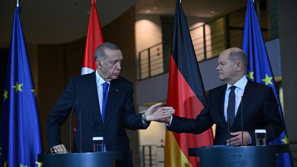 Cumhurbaşkanı Recep Tayyip Erdoğan, Almanya Başbakanı Olaf Scholz ile ortak basın toplantısı düzenledi.  - Sputnik Türkiye