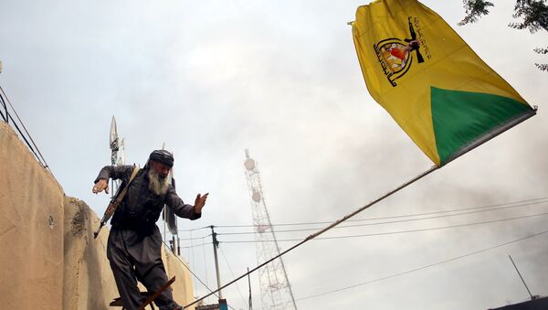 Peşmerhe güçleri, Tuzhurmatu'daki Şii milislere ait bayrağı indirdi - Sputnik Türkiye