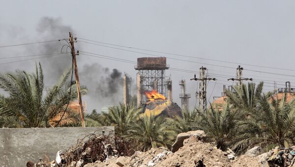 Bağdat'ın 20 kilometre kuzeyinde IŞİD'in düzenlediği bir intihar saldırısı. - Sputnik Türkiye