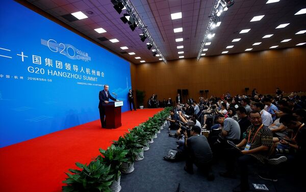 Cumhurbaşkanı Recep Tayyip Erdoğan, G20 Liderler Zirvesi için bulunduğu Çin'in Hangzhou kentinde basın toplantısı düzenledi. - Sputnik Türkiye