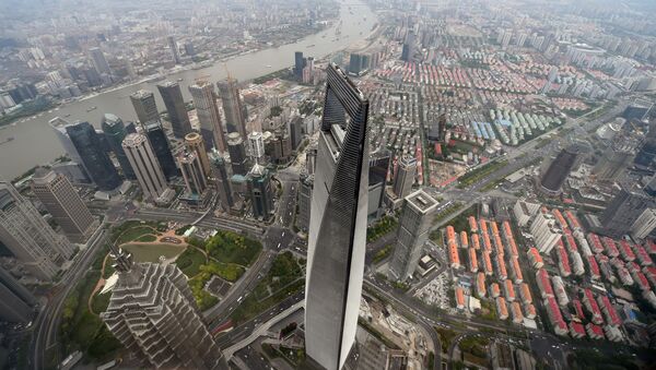 Shanghai’de bulunan yüksekliği 492 metre olan bir Çinli dev yani Dünya Finans Merkezi. Bu bina Çin’in en yüksek binası. Dünyada 5. sırada bulunuyor. - Sputnik Türkiye