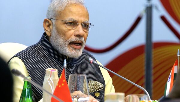 Indian Prime Minister Narendra Modi seen here at Taj Exotica Goa hotel, India at the BRICS Summit restricted meeting - Sputnik Türkiye