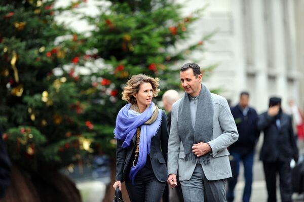 Suriye Devlet Başkanı Beşar Esad, eşi Esma ile birlikte Paris’te. - Sputnik Türkiye