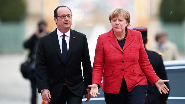 Fransa Cumhurbaşkanı François Hollande ve Almanya Başbakanı Angela Merkel - Sputnik Türkiye