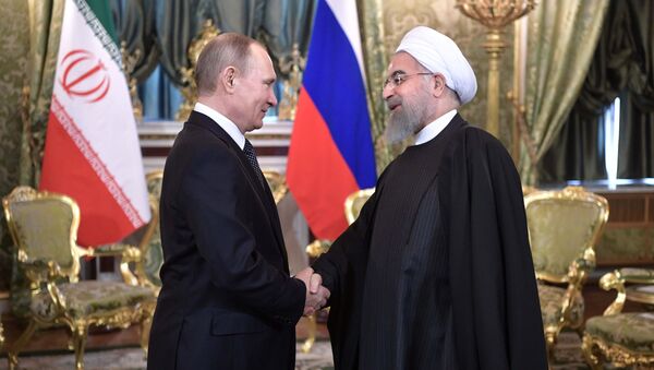 Rusya Devlet Başkanı Vladimir Putin ve İran Cumhurbaşkanı Hasan Ruhani - Sputnik Türkiye