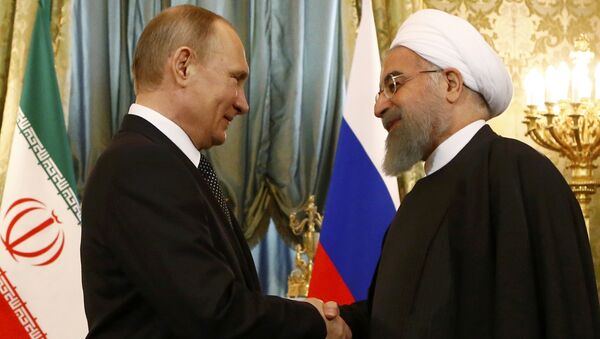 Rusya Devlet Başkanı Vladimir Putin ve İran Cumhurbaşkanı Hasan Ruhani - Sputnik Türkiye
