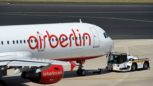 A photo taken on August 3, 2015 shows an Airbus of German airline Air Berlin on the runway in Duesseldorf, western Germany. - Sputnik Türkiye