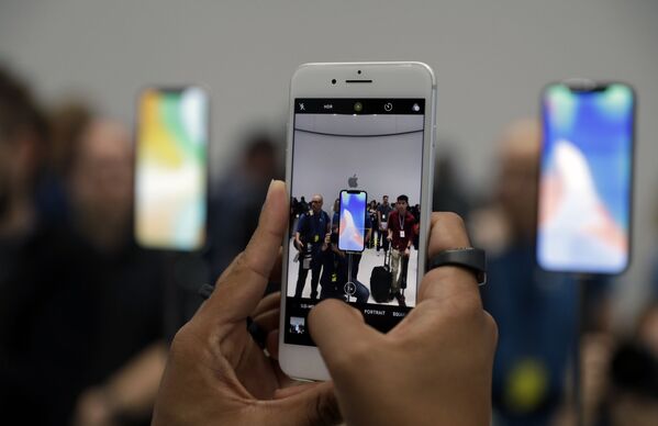 Apple, 3 yeni iPhone modeli tanıttı - Sputnik Türkiye