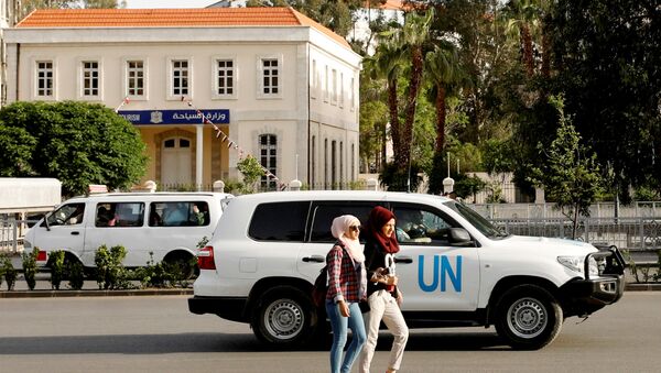 OPCW yetkililerini taşıyan BM aracı Şam'da - Sputnik Türkiye