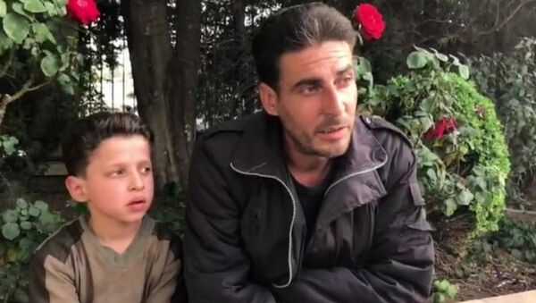 Suriyeli çocuk Hasan Diab ve babası - Sputnik Türkiye