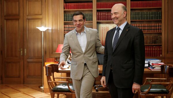 Moscovici, 3 Temmuz 2018'de 'müjdeler verdiği' Atina ziyaretinde Çipras ile de görüştü. - Sputnik Türkiye