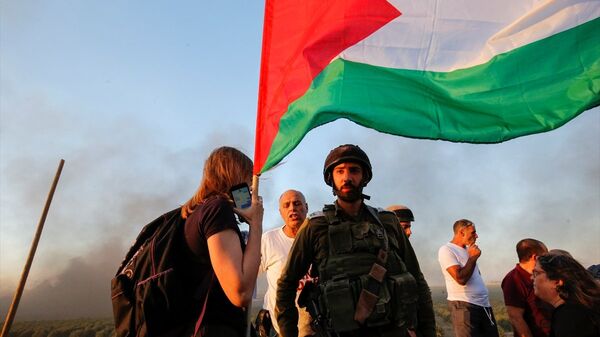 Gazze'ye destek eylemine katılan İsrailli aktivist Neta Golan, Filistin halkının topraklarına geri dönmesinin en doğal hakkı olduğunu söyledi. - Sputnik Türkiye