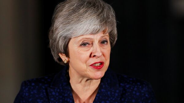 Britain's Prime Minister Theresa May speaks outside 10 Downing Street after a confidence vote by Conservative Party Members of Parliament (MPs), in London, Britain December 12, 2018. - Sputnik Türkiye