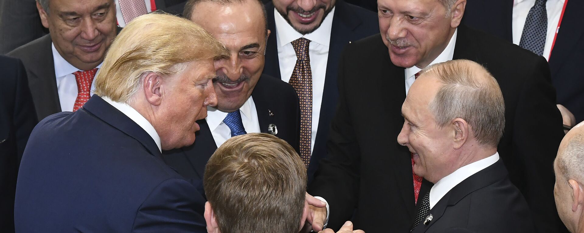 ABD Başkanı Donald Trump, Rusya Devlet Başkanı Vladimir Putin ve Türkiye Cumhurbaşkanı Recep Tayyip Erdoğan Japonya'daki G-20 Zirvesi'nde. - Sputnik Türkiye, 1920, 19.10.2022