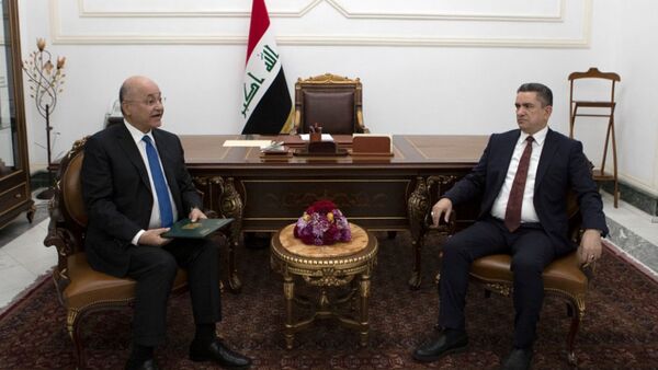 Irak Cumhurbaşkanı Berhem Salih, hükümeti kurma görevini eski Necef Valisi Adnan ez-Zurfi'ye verdi. - Sputnik Türkiye