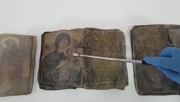 Kırıkkale'de Hristiyanlığın ilk dönemlerine ait ceylan derisi üzerine yazılı dua kitapları ele geçirildi - Sputnik Türkiye